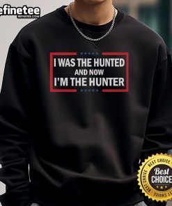 Official I Was The Hunted And Now I'm The Hunter sweatshirt featuring bold graphic design for stylish hunters.