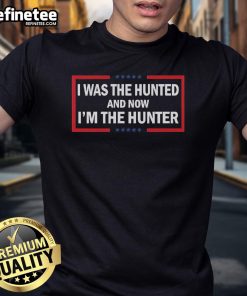 Alt Text: Official I Was The Hunted And Now I'M The Hunter T-Shirt featuring bold graphic design for hunters and outdoor enthusiasts.