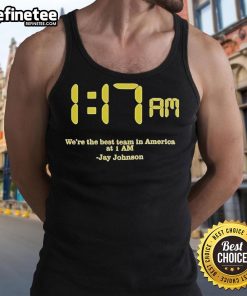 Alt Text: Jay Johnson in a stylish 'We Are The Best Team In America' tank top, showcasing team spirit and pride.
