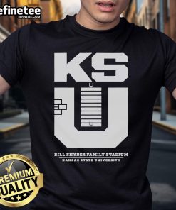 Alt Text: Official Kansas State Football Stadium KSU monogram t-shirt displayed on a hanger, featuring vibrant team colors and logo.