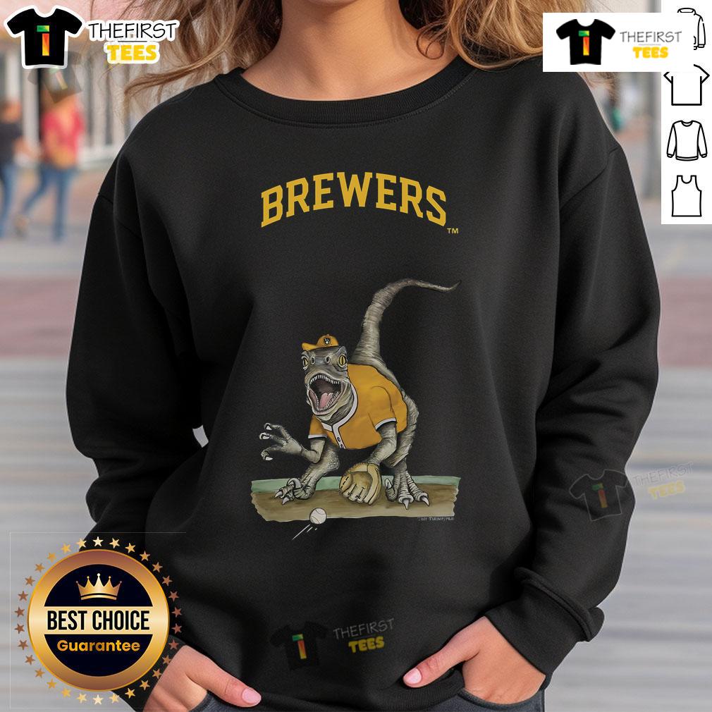 Official Milwaukee Brewers Tiny Turnip Velociraptor Sweatshirt Alt Text: Official Milwaukee Brewers Tiny Turnip Velociraptor Sweatshirt featuring a playful dinosaur design for fans.