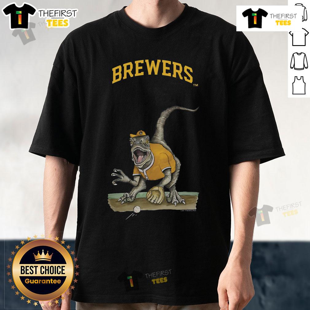 Official Milwaukee Brewers Tiny Turnip Velociraptor T Shirt Official Milwaukee Brewers Tiny Turnip Velociraptor T-Shirt featuring a fun dinosaur graphic for fans and kids.