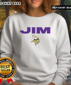 Alt Text: Official Minnesota Vikings sweatshirt honoring Jim Marshall, featuring team colors and a tribute design.