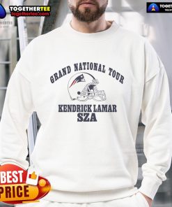 Official New England Patriots Kendrick Lamar SZA Grand National Tour sweatshirt featuring team colors and logos.
