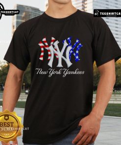 Alt Text: Official New York Yankees red, white, and blue T-shirt featuring the team's logo, perfect for fans and casual wear.