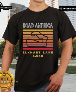 Alt Text: Official Nightfall Road America Elkhart Lake T-Shirt featuring a vibrant design celebrating motorsport events.