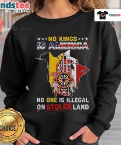 Official 'No King is America, No One is Illegal' sweatshirt design highlighting Native American land rights and social justice.