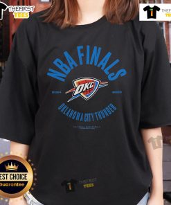 Alt Text: Official Oklahoma City Thunder 2025 NBA Finals Charging Foul Ladies Tee featuring team colors and logo design.