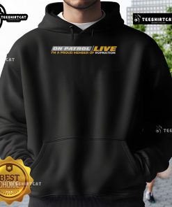 Official On Patrol Live I'm Proud Member of OpNation hoodie displayed on a hanger, showcasing vibrant design and logo.