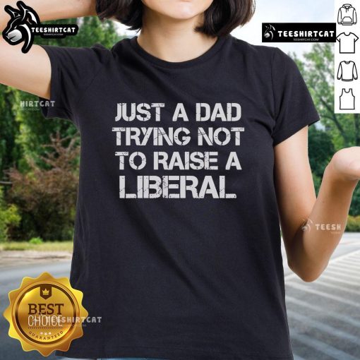 Official One Bad Dude Just A Dad Trying Not To Raise A Liberal Ladies Tee featuring a humorous dad-themed design.