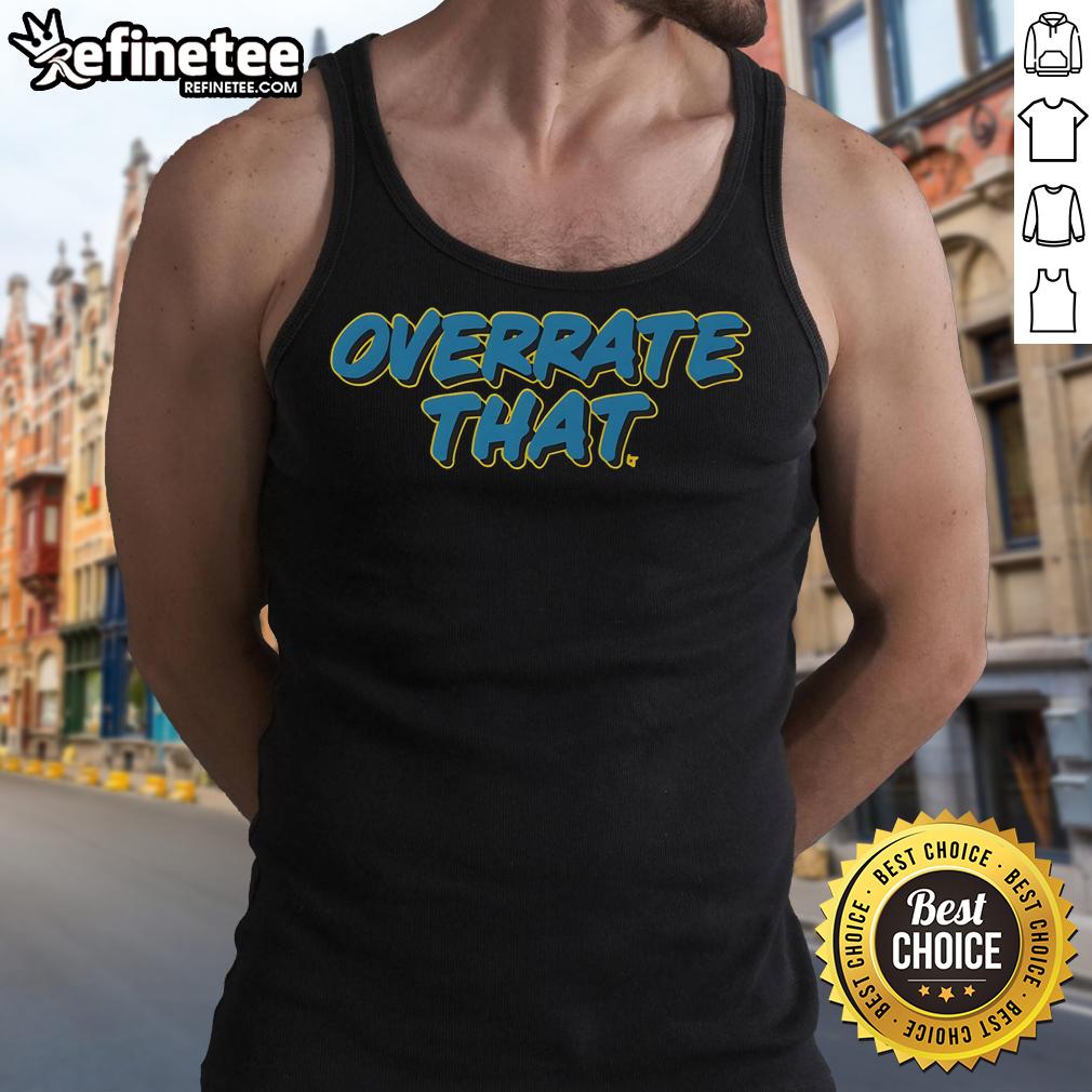 Official Pat Mcafee Wearing Overrate That Tank Top Pat McAfee wearing an 'Overrate That' tank top, showcasing his unique style and personality in a casual setting.