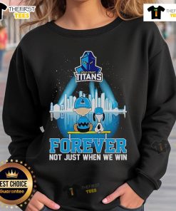 Alt Text: Official Peanuts x Gold Coast Titans Skyline Sweatshirt with 'Forever, Not Just When We Win' slogan.