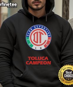 Alt Text: Official Toluca Diablos Rojos hoodie with round neck and champion shield design, perfect for fans.