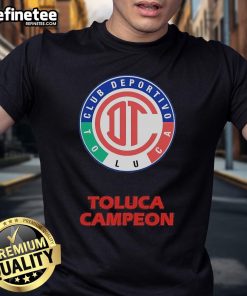 Alt Text: Official Playera Toluca Diablos Rojos Cuello Redondo T-Shirt featuring the Champion emblem and vibrant team colors.