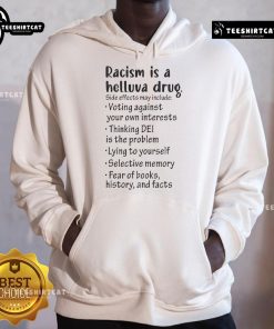 Black hoodie with 'Racism Is A Helluva Drug' slogan, highlighting the side effects of voting against your own interests.