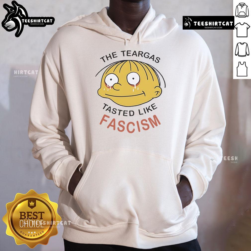 Official Ralph Wiggum The Teargas Tastes Like Fascism Hoodie Alt Text: Official Ralph Wiggum teargas tastes like fascism hoodie in vibrant colors, featuring iconic cartoon character design.