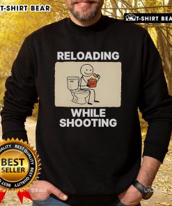 Official Reloading While Shooting Toilet Humor Sweatshirt featuring a funny design for shooting enthusiasts.