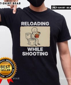 Funny 'Reloading While Shooting' toilet humor t-shirt design featuring playful graphics and bold text for gun enthusiasts.