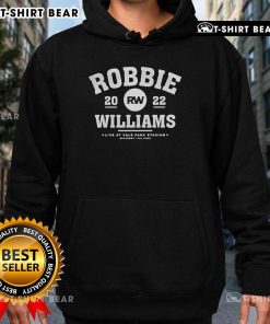 Robbie Williams performing live at Vale Park Stadium on June 4th, wearing a stylish hoodie during the concert.
