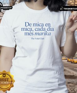Official Rosalia wearing De Mica En Mica Cada Dia tee at Marika The Valid Club, showcasing stylish women's fashion.
