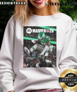 Alt Text: Saquon Barkley in a Philadelphia Eagles sweatshirt, featured on the cover of Madden NFL, showcasing his iconic hurdle.