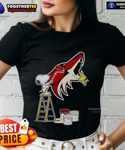 Official Snoopy and Woodstock painting on Arizona Coyotes logo ladies tee, showcasing a fun and stylish design.