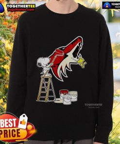 Alt Text: Official Snoopy and Woodstock painting on Arizona Coyotes logo sweatshirt, perfect for fans and collectors.