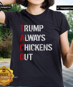 Official Taco Trump Always Chickens Out Ladies Tee featuring a bold graphic design and playful text in vibrant colors.