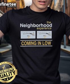 Official The Neighborhood Experience Coming In Low T-Shirt featuring bold graphics and vibrant colors in a stylish design.