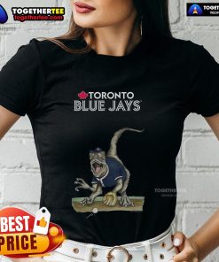 Alt Text: Official Toronto Blue Jays Tiny Turnip Velociraptor Ladies Tee featuring a fun dinosaur graphic for fans.
