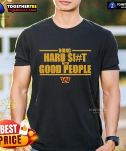 Official Washington Commanders 'Doing Hard Shit With Good People' T-Shirt featuring team logo and bold text design.