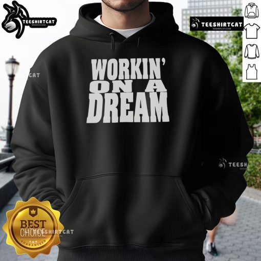 Alt Text: Official Workin' On A Dream Hoodie, featuring a stylish design perfect for casual wear and inspiring creativity.