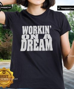 Official 'Workin On A Dream' ladies tee featuring a stylish design, perfect for casual wear and fan merchandise.