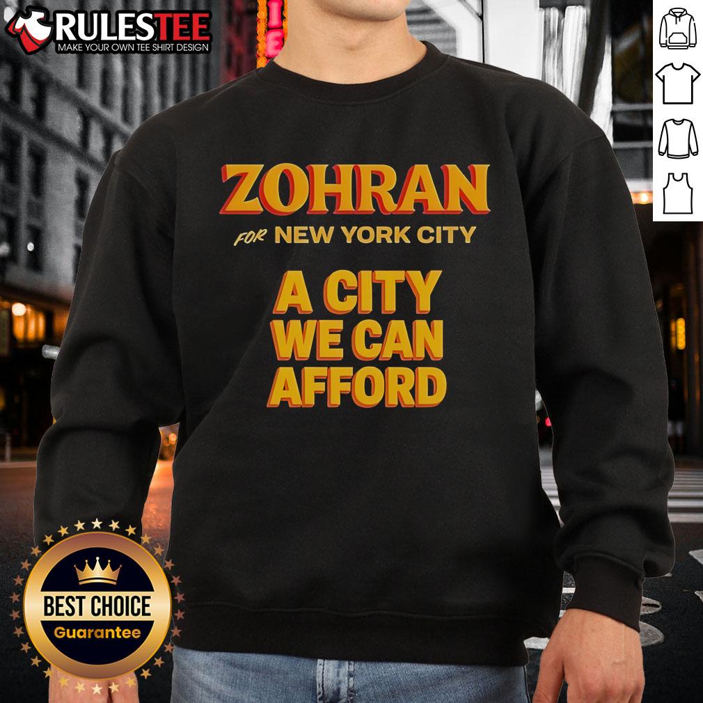 Official Zohran For New York City A City We Can Afford Sweatshirt Official Zohran for New York City sweatshirt promoting affordable living in NYC, featuring bold graphics and vibrant colors.