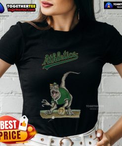 Alt Text: Original Athletics Tiny Turnip Velociraptor Ladies Tee featuring a vibrant dinosaur graphic on a stylish shirt.