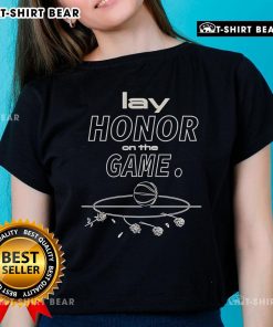 Caitlin Clark with Indiana Fever, honoring the game in a stylish ladies tee during a basketball event.