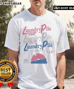 Premium Arkells Laundry Pile T-Shirt displayed on a wooden surface, featuring a stylish design and soft fabric.