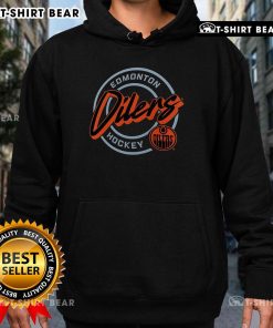 Premium Edmonton Oilers Hockey Colorblock Puck Logo Hoodie in blue and orange, perfect for fans and casual wear.