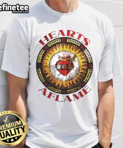 Alt Text: Premium Hearts Aflame Filthy Lucre Logo T-Shirt featuring a bold logo design on a stylish, comfortable fabric.