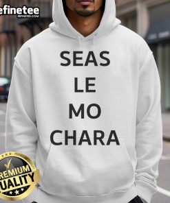 Alt Text: Premium Le Boom wearing Seas Le Mo Chara hoodie, showcasing stylish design and vibrant colors in a casual setting.