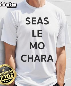 Alt Text: Premium Le Boom models the Seas Le Mo Chara T-shirt, showcasing vibrant design and stylish fit for casual wear.