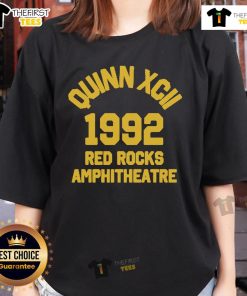 Alt Text: Premium Quinn XCII Red Rocks 2025 Collegiate Ladies Tee featuring a stylish design and vibrant colors for fans.