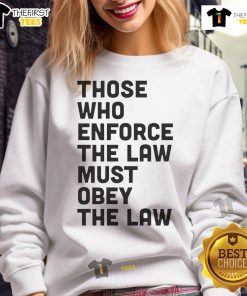 Premium sweatshirt featuring the quote 'Those Who Enforce The Law Must Obey The Law' in stylish font.