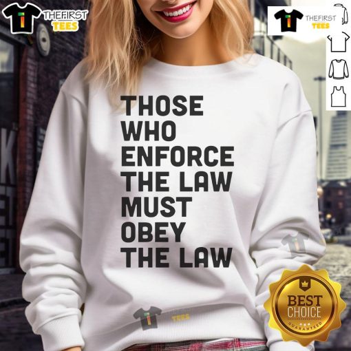 Premium sweatshirt featuring the quote 'Those Who Enforce The Law Must Obey The Law' in stylish font.