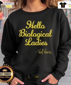 Premium Val Vens wearing a Hello Biological ladies' sweatshirt, showcasing style and comfort in a casual setting.