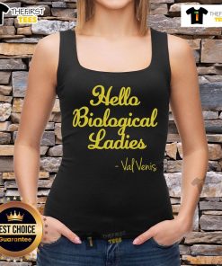 Premium Val Vens wearing a Hello Biological ladies tank top, showcasing stylish and eco-friendly fashion.