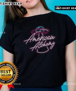 Pretty American Alchemy UFO neon logo on a stylish ladies tee, perfect for UFO enthusiasts and fashion lovers.