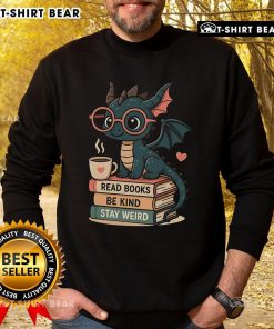Alt Text: Cozy sweatshirt featuring pretty dragons and books design, perfect for kind and weird book lovers.