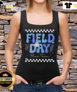 Blue Team in vibrant tank tops during a fun field day trip color game competition, showcasing team spirit and excitement.