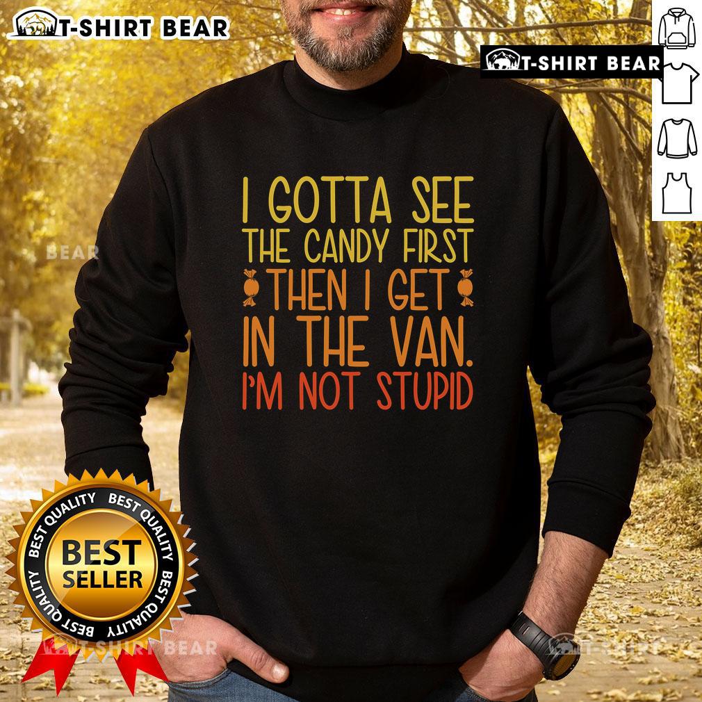 Pretty I Gotta See The Candy First Then I Get In The Van Stupid Sweatshirt Child in a colorful 'Pretty I Gotta See The Candy First Then I Get In The Van' sweatshirt, smiling with excitement.